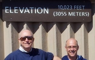 Bill and Grant at elevation sign